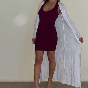 Never worn, with tags. White duster. LA Made purchased from Revolve